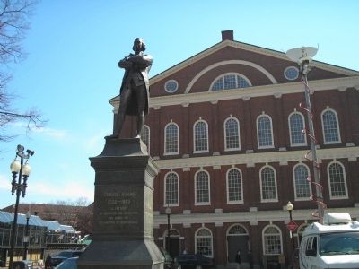 Samuel Adams in front of Faneuil Hall image. Click for full size.