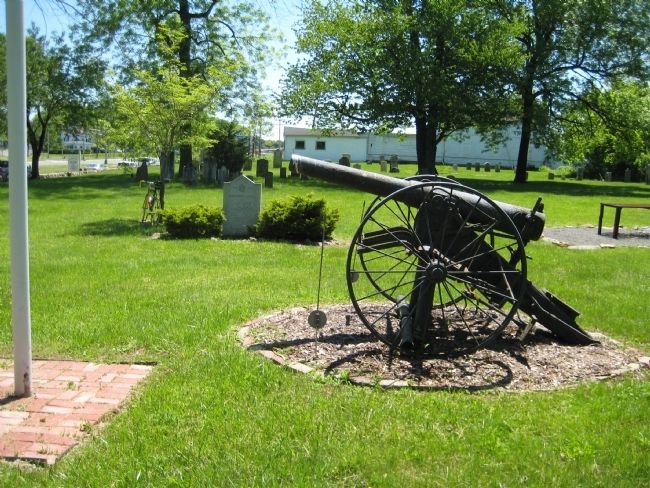 Cannon with Historic Sites marker in distance. Click for full size. Cannon with Historic Sites marker in distance image. Click for full size.
