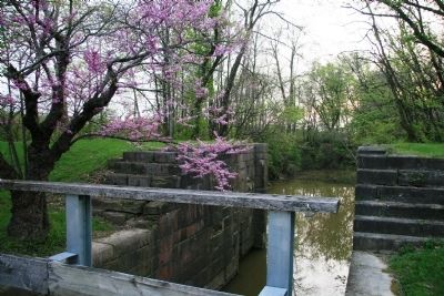 View of the south end of canal lock #13. image. Click for full size.