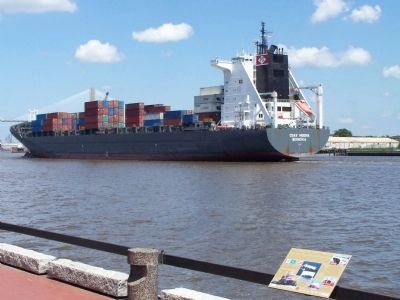 Shipping in the Port of Savannah Marker as a Container ship passes by image. Click for full size.