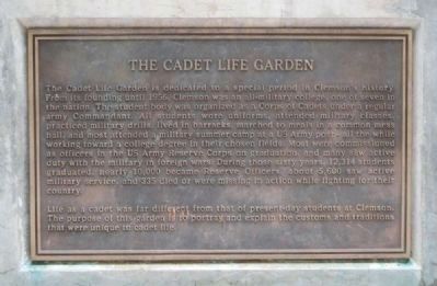 Cadet Life Garden Marker -<br>Located on the East Base of the Guardroom Bell Structure image. Click for full size.
