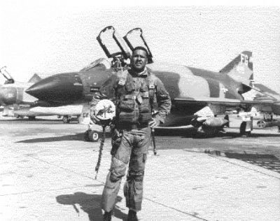 Tuskegee Airman, then-Col. Daniel "Chappie" James and his F-4C Phantom II fighter plane image. Click for full size.