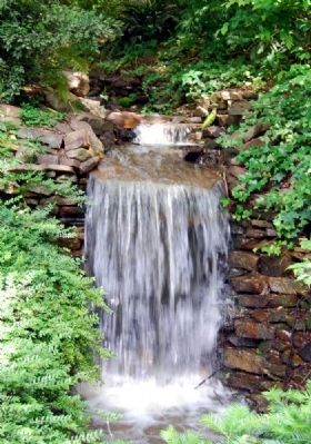 Small Waterfall Emptying into Heritage Pond image. Click for full size.