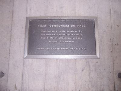 Plaque on opposite side of the wall from the 9XM-WHA marker image. Click for full size.