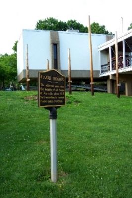 Flood Heights Marker with Poles in Background. Click for full size. Flood Heights Marker with Poles in Background image. Click for full size.