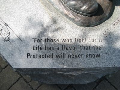 Inscription at base of statue image. Click for full size.