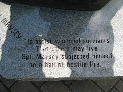 Inscription at base of statue image. Click for full size.