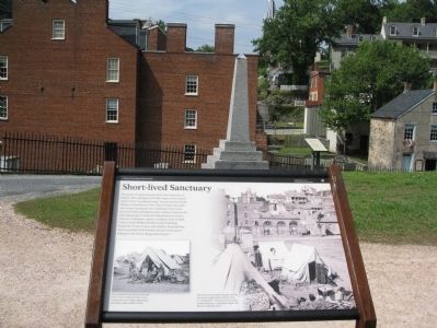 Short-lived Sanctuary Marker looking toward the John Brown Monument. image. Click for full size.