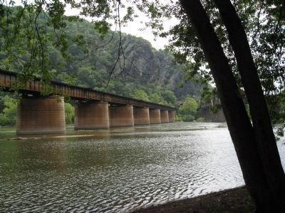 Railroad bridge over the Potomac River behind the marker. image. Click for full size.