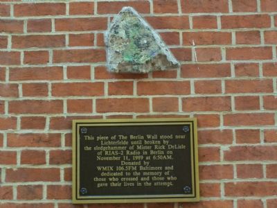 Berlin Wall relic mounted on side of Zion Church image. Click for full size.