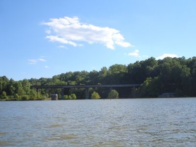View of modern bridge and dam from middle of Lake Accotink. Click for full size. View of modern bridge and dam from middle of Lake Accotink image. Click for full size.