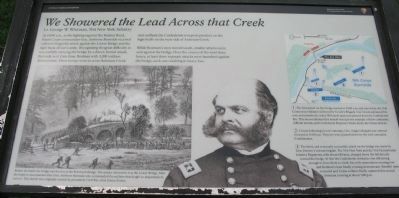 We Showered the Lead Across that Creek Marker image. Click for full size.