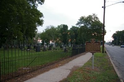 Marker, in front of Woodland Cemetery image. Click for full size.