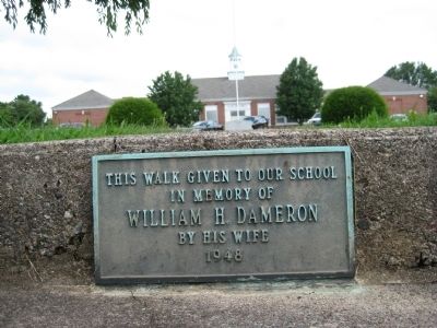 Dedication Plaque on walkway. image. Click for full size.