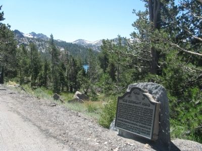 Old Emigrant Road Marker with Caples Lake in Background image. Click for full size.