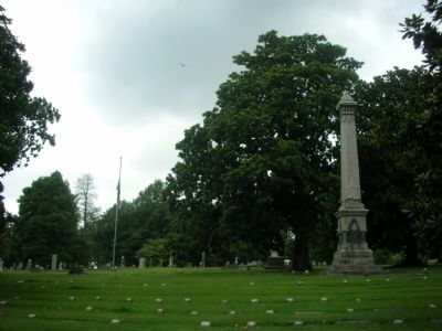 Confederate Dead Monument and Confederate Flag. Click for full size. Confederate Dead Monument and Confederate Flag image. Click for full size.