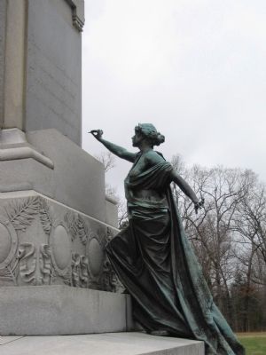 Another View of the Bronze Figure "Fame". Click for full size. Another View of the Bronze Figure "Fame" image. Click for full size.