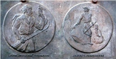 Close-Up of Relief Art on Marker image. Click for full size.