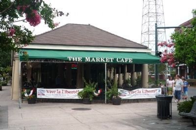 The Market Cafe (decorated for Bastille Day celebration) at the south end of the French Market image. Click for full size.