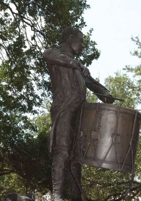 Haitian Monument statue that represents young Henri Christophe as a drummer image. Click for full size.