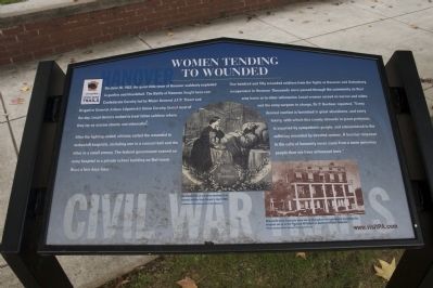 Women Tending to Wounded Marker. Click for full size. Women Tending to Wounded Marker image. Click for full size.