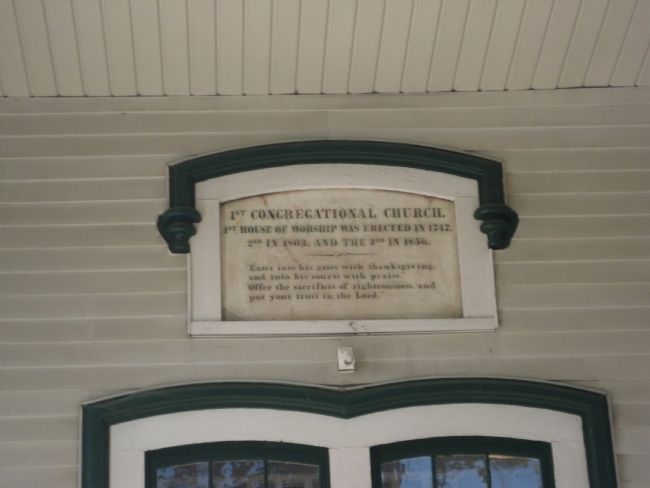 Plaque above main entrance image. Click for full size.