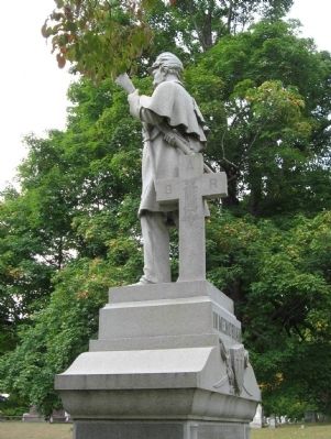 Left Side of the Statue and Cross. Click for full size. Left Side of the Statue and Cross image. Click for full size.