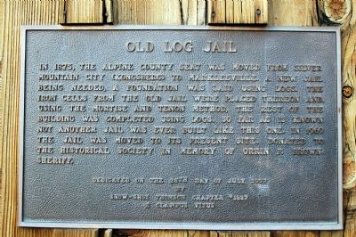 Old Log Jail Marker image. Click for full size.