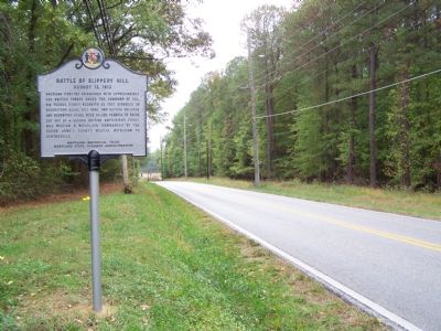View of marker and road. image. Click for full size.