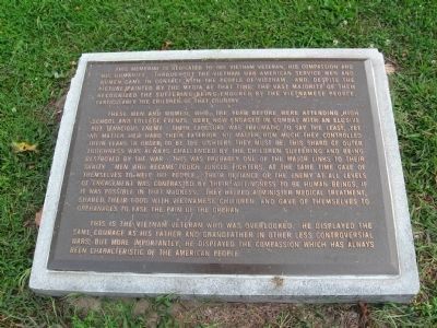 Plaque in front of the monument image. Click for full size.