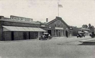 View of Minden Dry Goods Store and COD Garage (1920s). Click for full size. View of Minden Dry Goods Store and COD Garage (1920s) image. Click for full size.