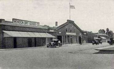 View of Minden Dry Goods Store and COD Garage (1920s) image. Click for full size.