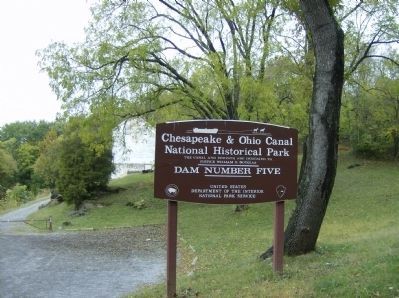Entrance sign to Dam 5 site image. Click for full size.