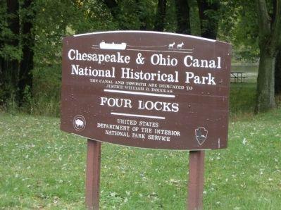 NPS sign at entrance to Four Locks site image. Click for full size.