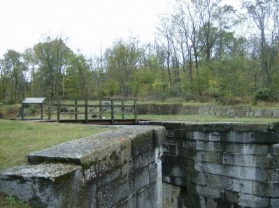 View from south-side of Lock #49 with the remains of a warehouse in the background image. Click for full size.