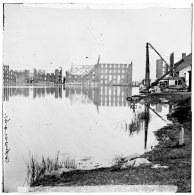 Richmond, Va. Ruined buildings on banks of the Canal Basin. image. Click for full size.