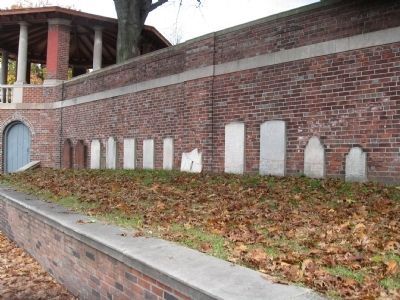 Headstones Along the Wall image. Click for full size.