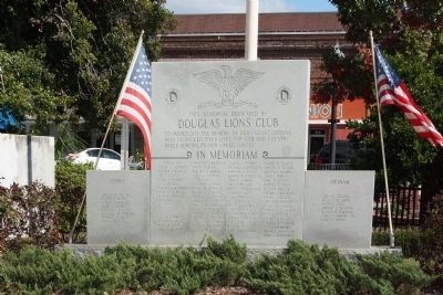 Coffee County Courthouse and Douglas Lions Club Armed Forces Memorial. Click for full size. Coffee County Courthouse and Douglas Lions Club Armed Forces Memorial image. Click for full size.
