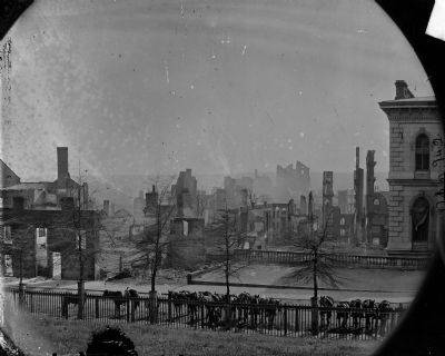 Burnt district (horses hitched to iron fence on foreground) image. Click for full size.