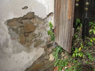 Exposed Adobe Bricks on Side of Building image. Click for full size.
