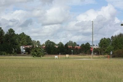 Trackside warehouses of yesteryear only visible signs of railroad days, seen today image. Click for full size.