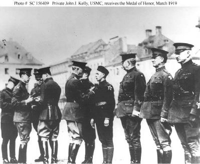 Private John J. Kelly, USMC receiving the Medal of Honor image. Click for full size.