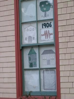Student Quilt Art on Display in the Schoolhouse Window. Click for full size. Student Quilt Art on Display in the Schoolhouse Window image. Click for full size.