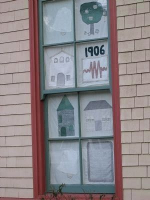 Student Quilt Art on Display in the Schoolhouse Window image. Click for full size.