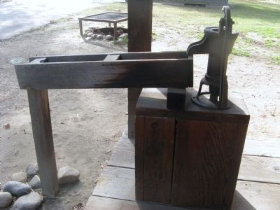 Water Pump on the Porch of the Cabin image. Click for full size.