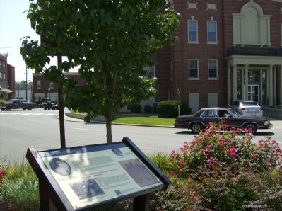 The Cannonball Marker (foreground) with the Hardin County Courthouse in the background image. Click for full size.