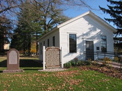 Markers and Schoolhouse. Click for full size. Markers and Schoolhouse image. Click for full size.