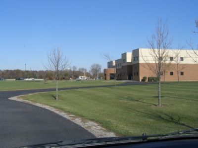Approach to the school and the marker is barely visible image. Click for full size.
