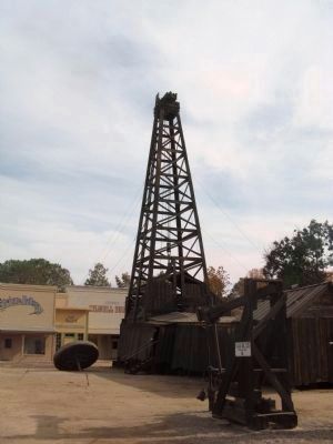 Cable Tool Drilling Rig and George O. Suman Memorial Pioneer Petroleum Exhibits Buildings. Click for full size. Cable Tool Drilling Rig and George O. Suman Memorial Pioneer Petroleum Exhibits Buildings image. Click for full size.