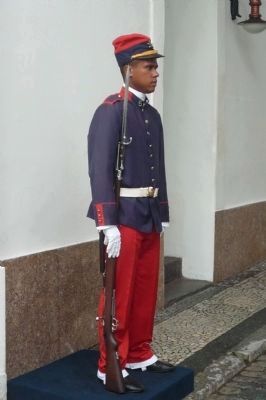 Sentry in ceremonial dress uniform at inner gateway to fort image. Click for full size.